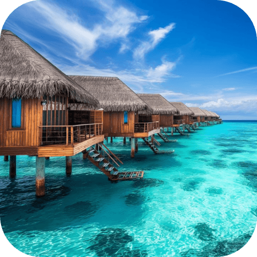 Bungalow sull'acqua lungo una laguna turchese alle Maldive